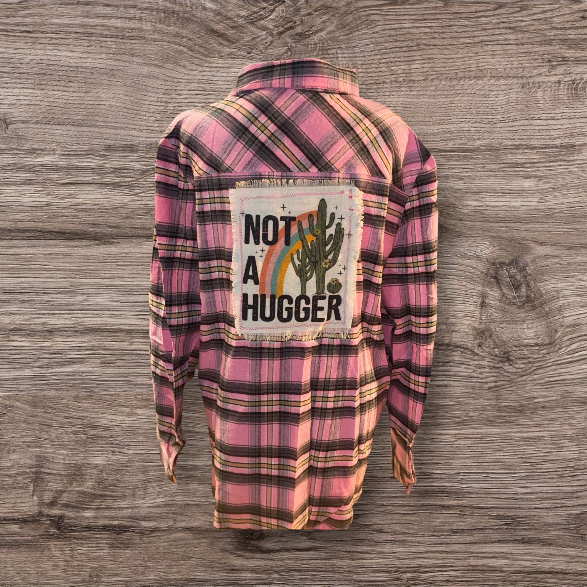 🌵 “Not a Hugger” Pink Plaid Flannel